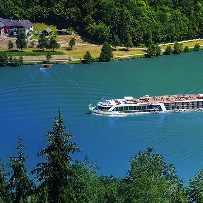 A Danube River Cruise ship sailing across the breathtaking Danube River
