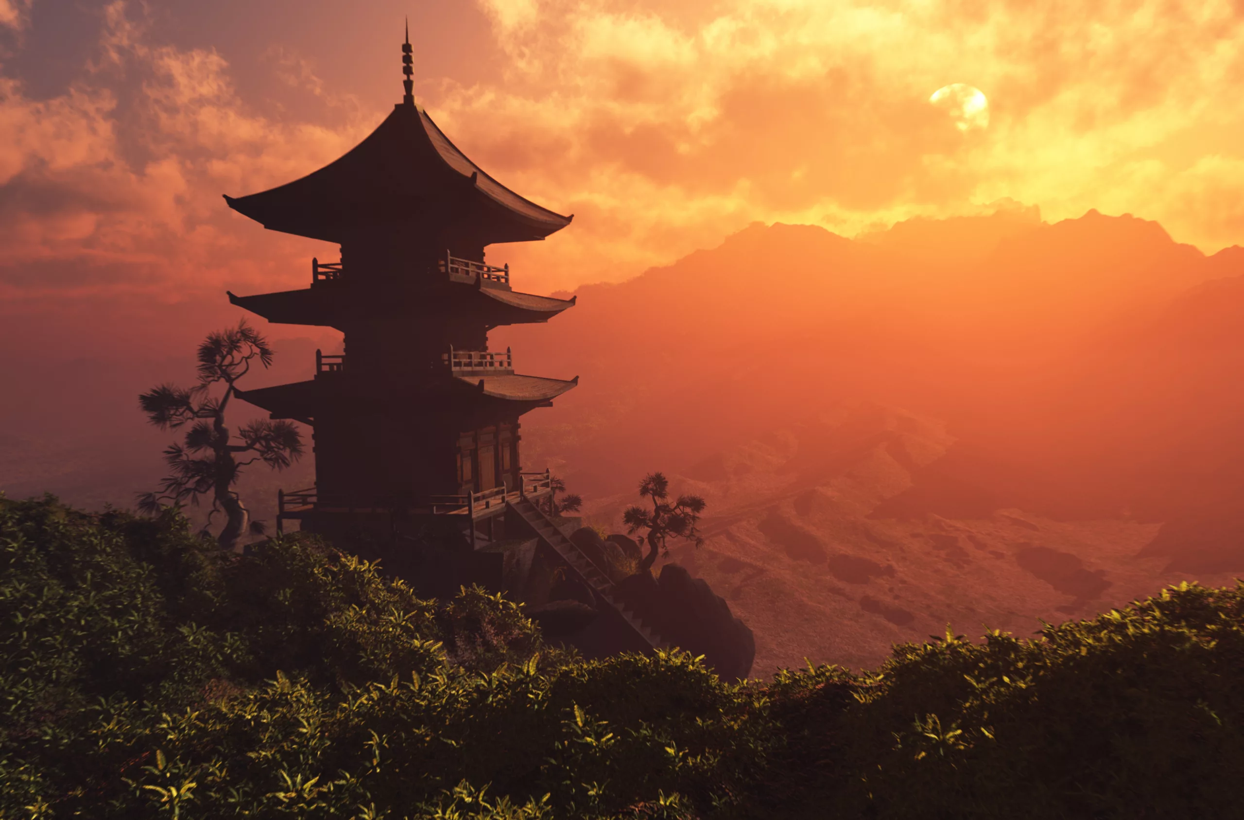 A picture of an Asian building overlooking a valley at sunset